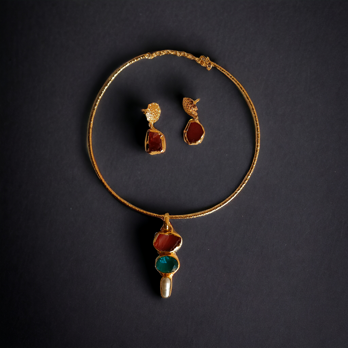 Aqua- Red Stones Brass Hasli