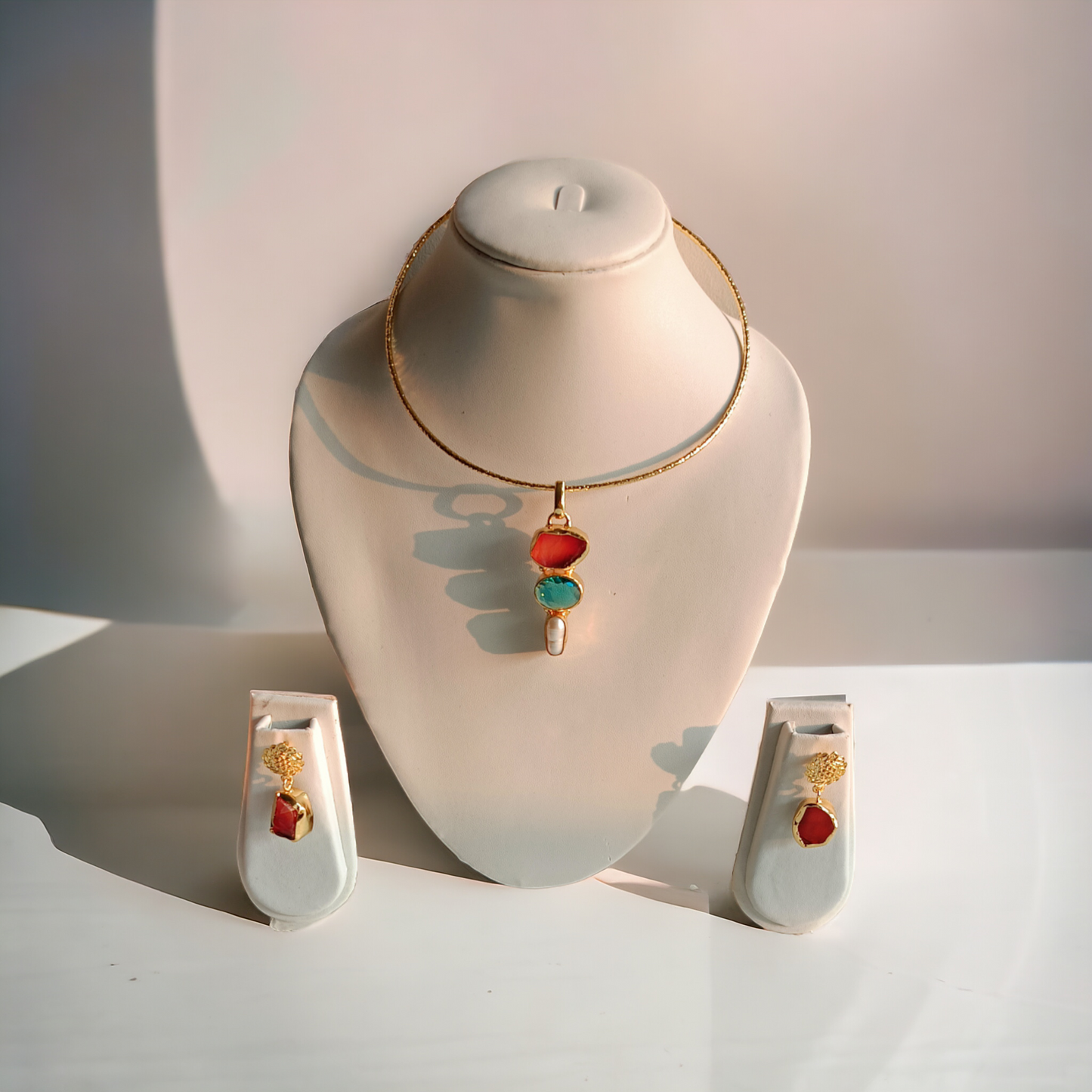 Aqua- Red Stones Brass Hasli