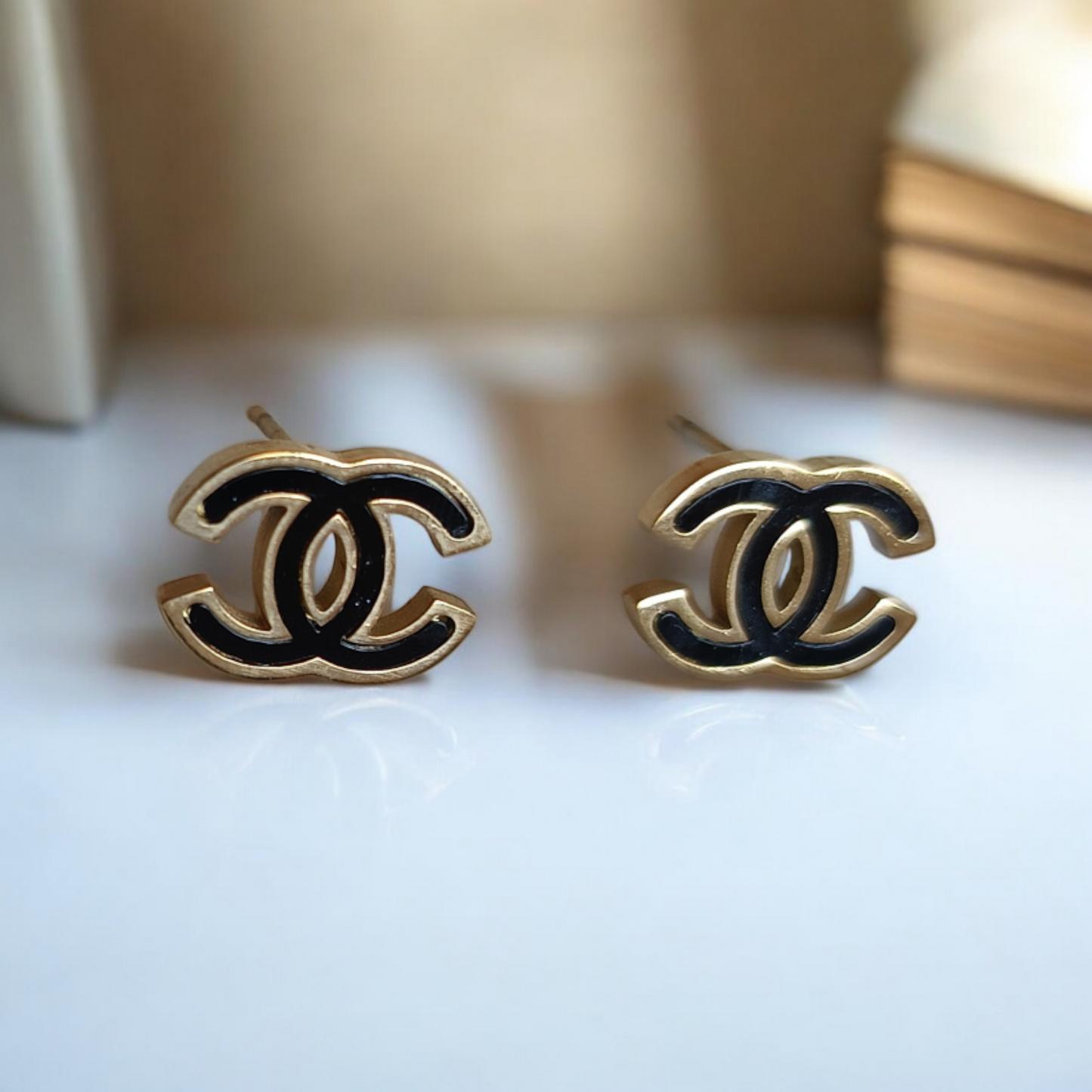 Black Cc stud Earrings